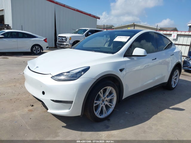 2023 TESLA MODEL Y 7SAYGDEE1PA127412 Photo 1