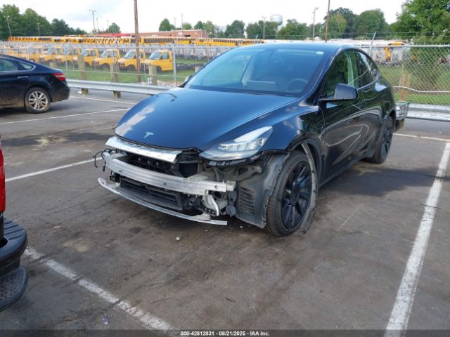 2022 TESLA MODEL Y 7SAYGDEE6NF425647 Photo 1