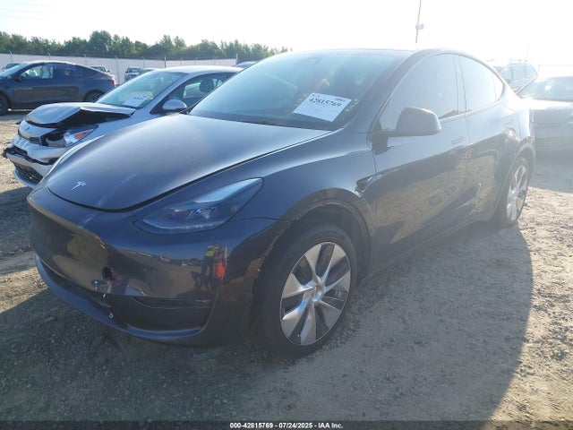2024 TESLA MODEL Y 7SAYGDEE6RA255860 Photo 1