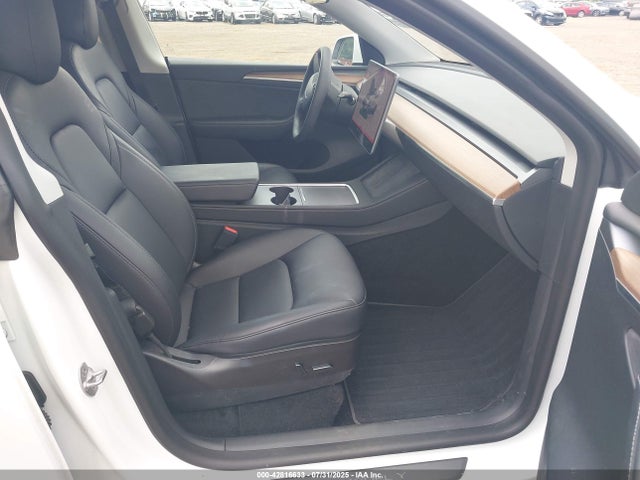 2023 TESLA MODEL Y 7SAYGAEE9PF585491 Photo 4