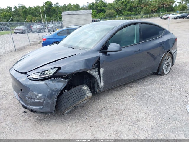 2023 TESLA MODEL Y 7SAYGDEE4PF613988 Photo 1