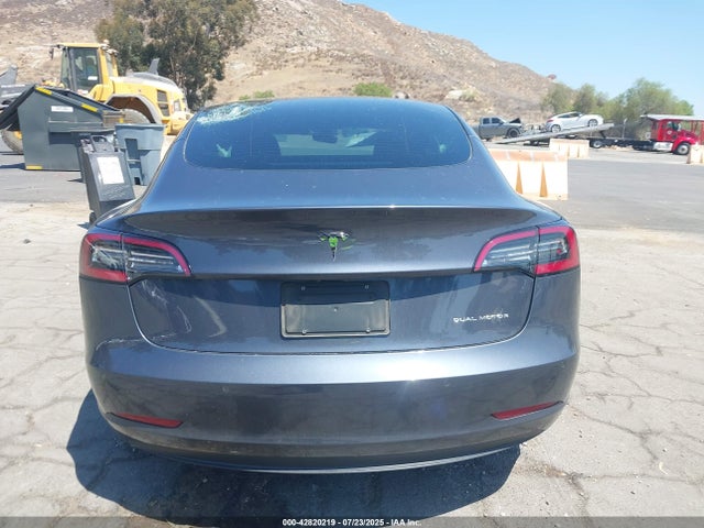 5YJ3E1EB1NF239354 Tesla 2022