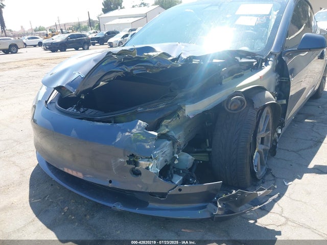 5YJ3E1EB1NF239354 Tesla 2022