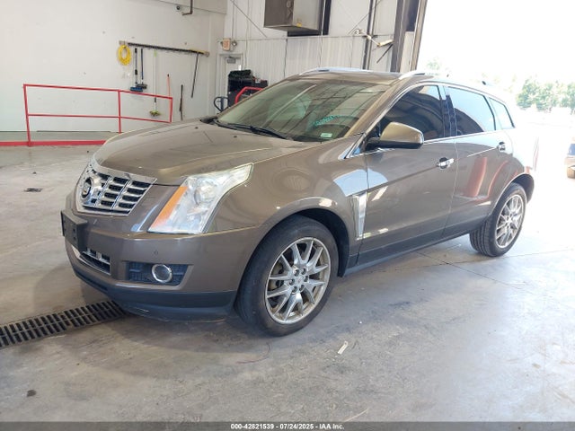 2014 CADILLAC SRX 3GYFNCE39ES547911 Photo 1