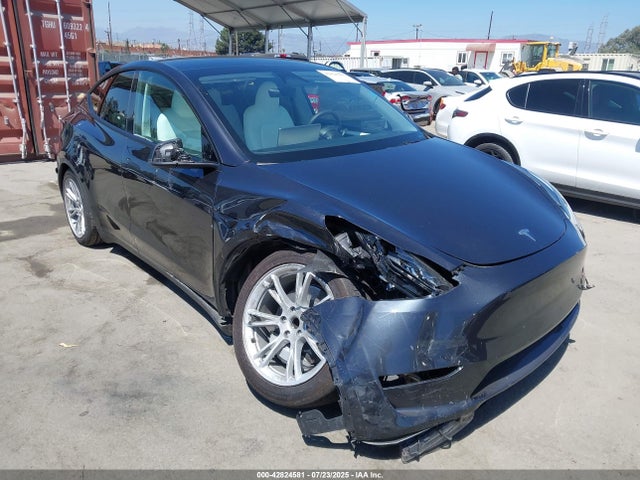 2024 TESLA MODEL Y 7SAYGDED5RF093343 Photo 0