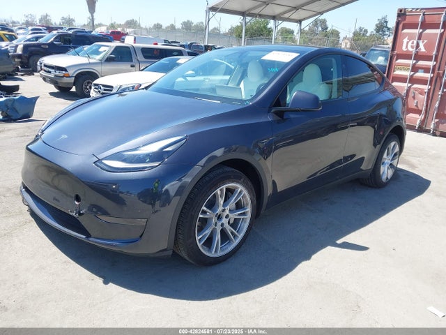 2024 TESLA MODEL Y 7SAYGDED5RF093343 Photo 1