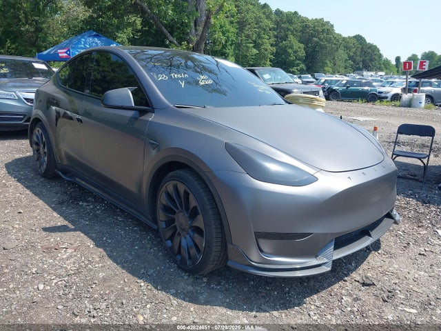 2023 TESLA MODEL Y 7SAYGDEF6PF705175 Photo 0