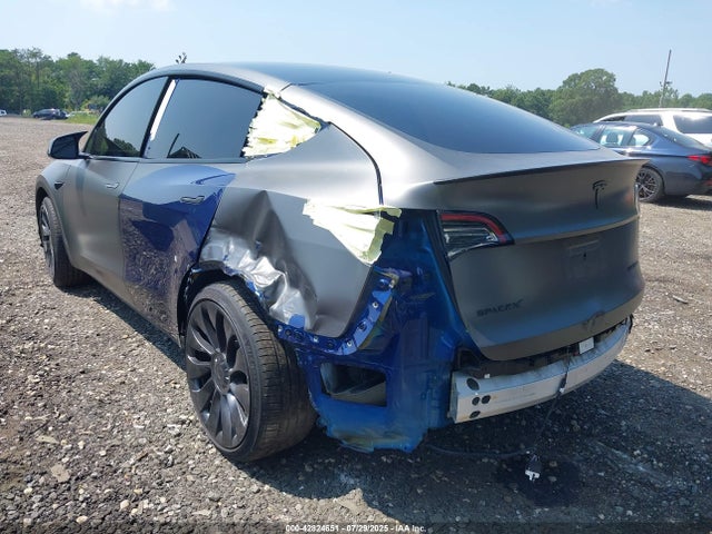 2023 TESLA MODEL Y 7SAYGDEF6PF705175 Photo 2