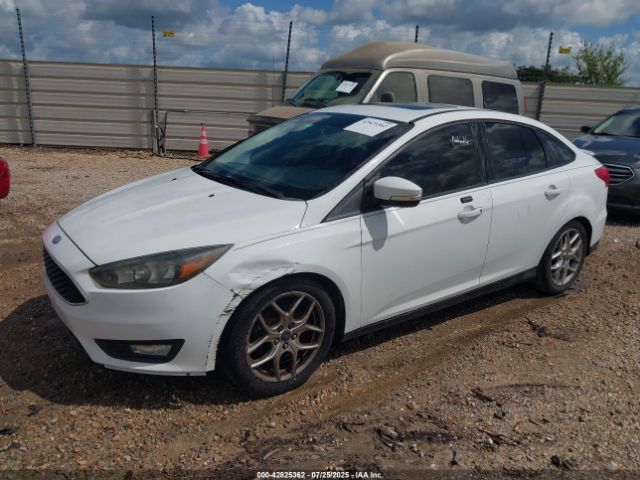 2015 FORD FOCUS 1FADP3F23FL200715 Photo 1