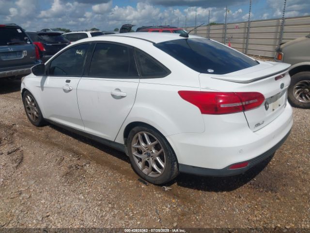 2015 FORD FOCUS 1FADP3F23FL200715 Photo 2