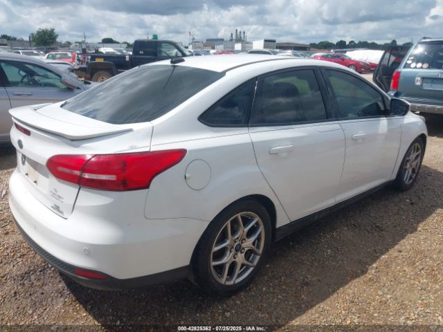 2015 FORD FOCUS 1FADP3F23FL200715 Photo 3