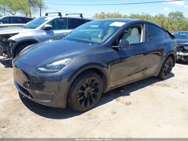 2024 TESLA MODEL Y 7SAYGAEE4RF991794 Photo 1