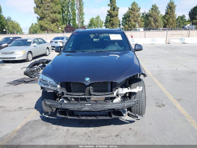 5UXKR0C50J0Y00724 BMW 2018