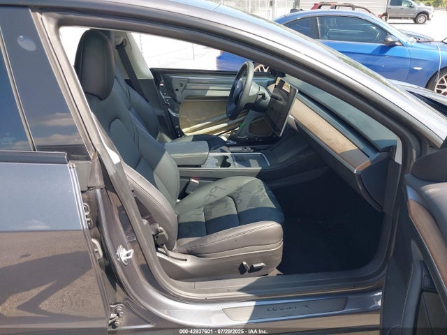 2023 TESLA MODEL 3 5YJ3E1EAXPF642632 Photo 4