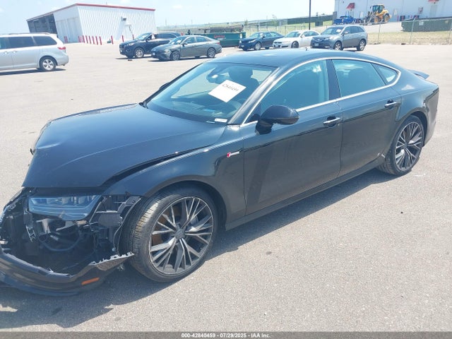 2016 AUDI A7 WAU2GAFC9GN043340 Photo 1