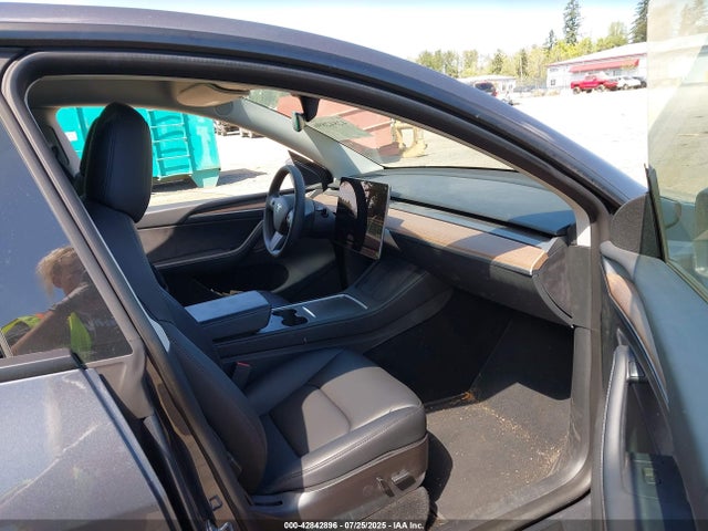 2023 TESLA MODEL Y 7SAYGDEF5PF591220 Photo 4