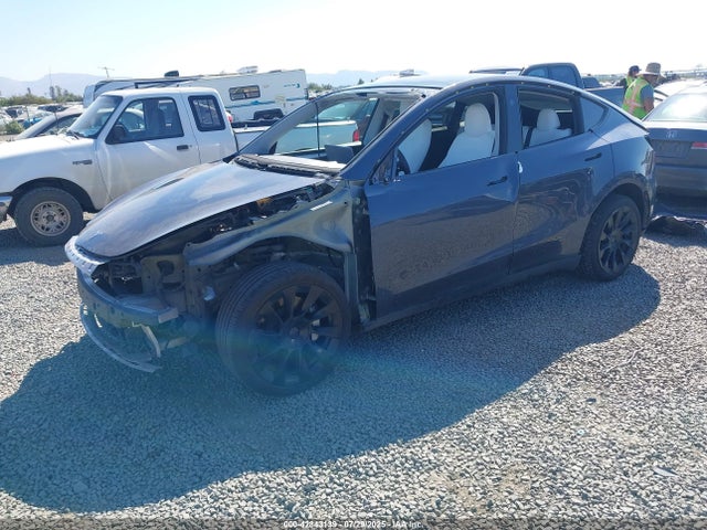 2023 TESLA MODEL Y 7SAYGDEE1PF900768 Photo 1