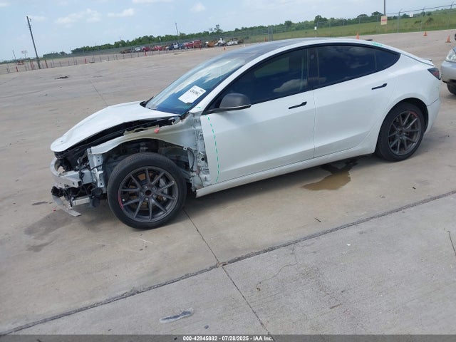 2023 TESLA MODEL 3 5YJ3E1EA9PF430613 Photo 1