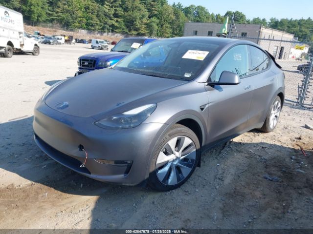 2023 TESLA MODEL Y 7SAYGAEE9PF945648 Photo 1