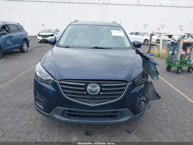 JM3KE2DYXG0688936 Mazda py