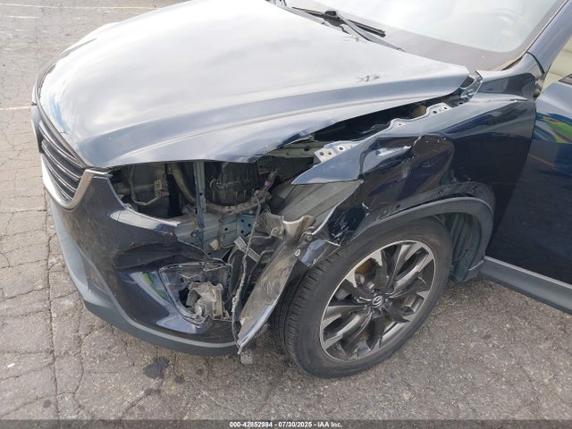 JM3KE2DYXG0688936 Mazda py