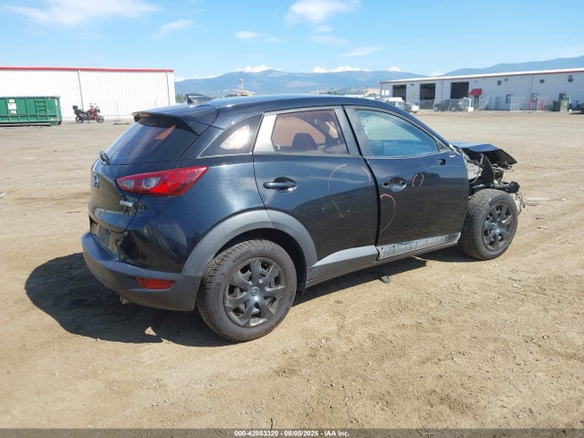 Mazda pe 2016 JM1DKBB76G0108635 Image 4