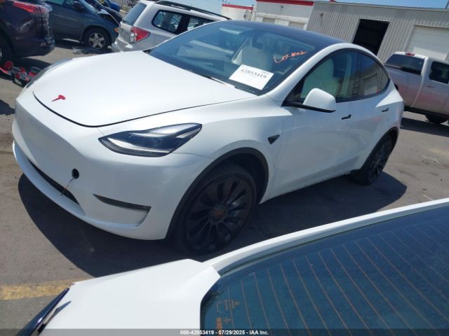 2023 TESLA MODEL Y 7SAYGDEF9PF740292 Photo 1