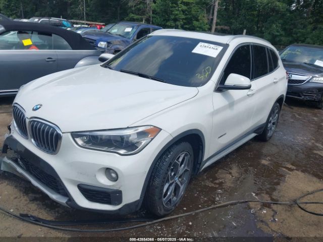 2017 BMW X1 WBXHT3Z33H4A65329 Photo 1