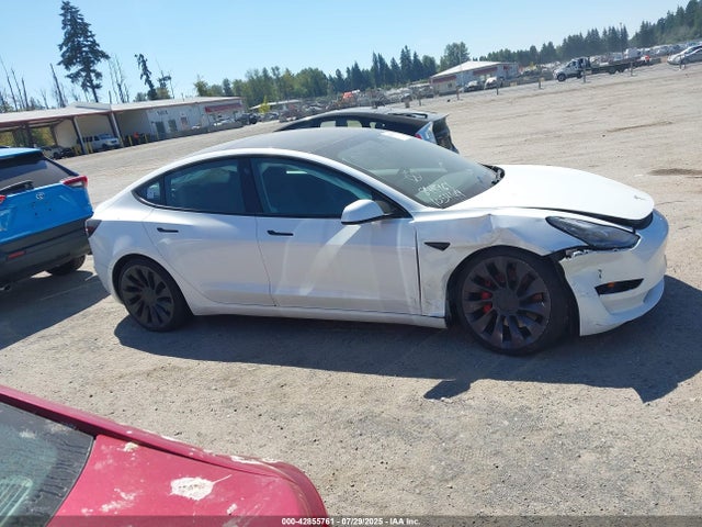 5YJ3E1EC4MF064900 Tesla 2021