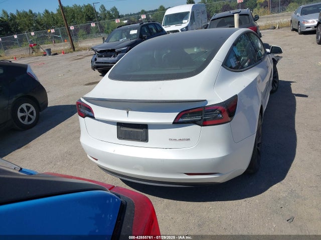 5YJ3E1EC4MF064900 Tesla 2021