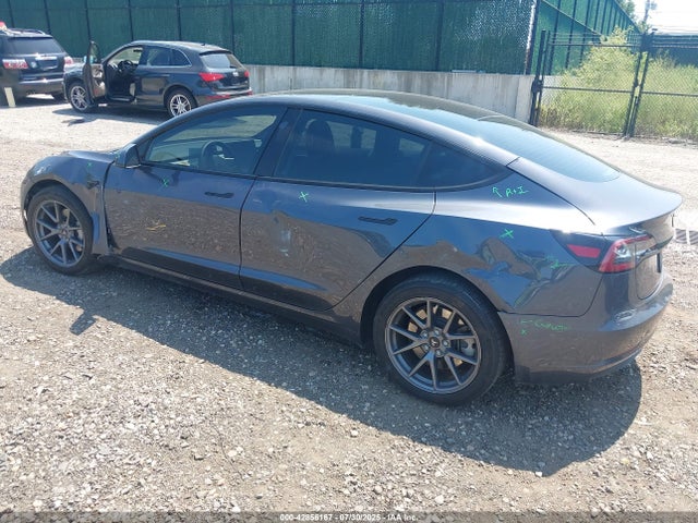 2023 TESLA MODEL 3 5YJ3E1EB7PF664547 Photo 2