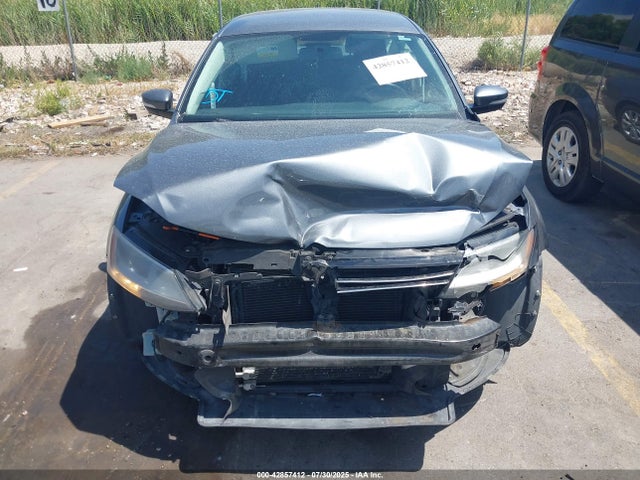 3VWD07AJ2EM317488 Volkswagen Jetta