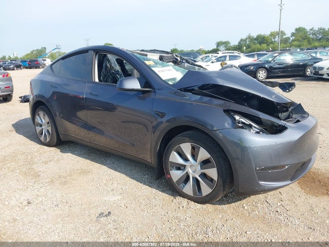 2023 TESLA MODEL Y 7SAYGDEE1PF648603 Photo 0