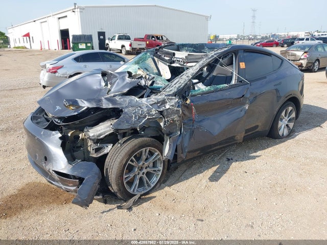 2023 TESLA MODEL Y 7SAYGDEE1PF648603 Photo 1