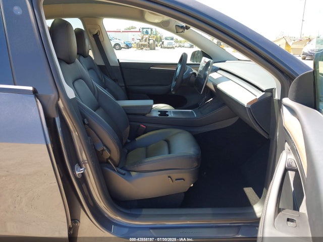 2023 TESLA MODEL Y 7SAYGAEE0PF869737 Photo 4