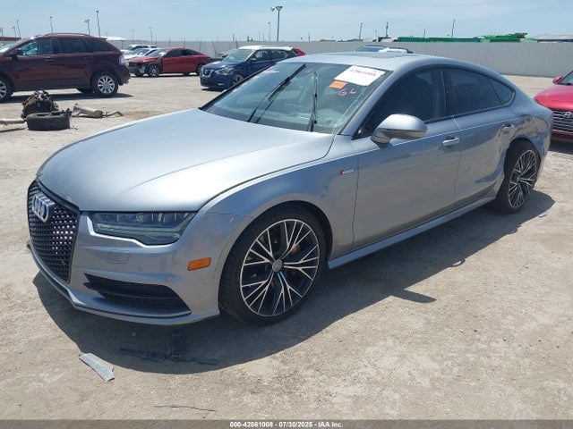 2016 AUDI A7 WAU2GAFC9GN003520 Photo 1