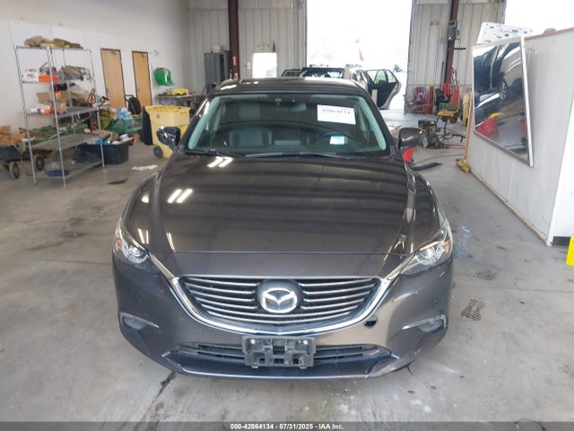 JM1GJ1W51G1430371 Mazda py