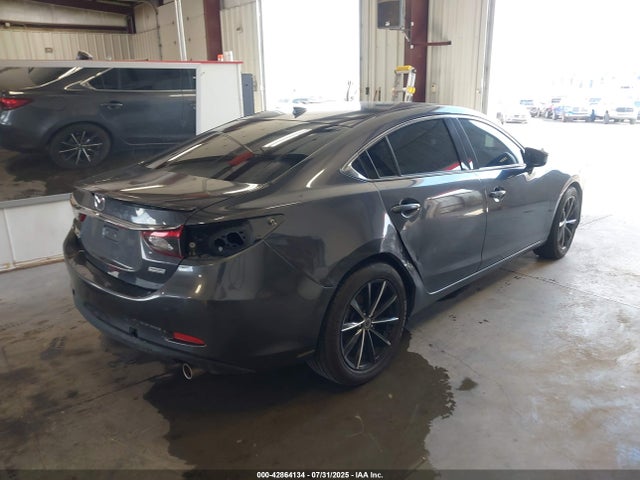 JM1GJ1W51G1430371 Mazda py