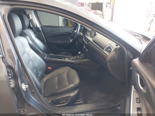 JM1GJ1W51G1430371 Mazda py