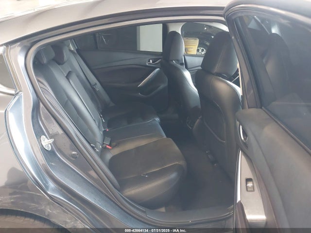 JM1GJ1W51G1430371 Mazda py