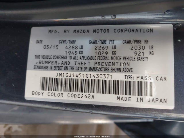 JM1GJ1W51G1430371 Mazda py