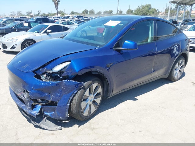 2023 TESLA MODEL Y 7SAYGAEE4PF636380 Photo 1