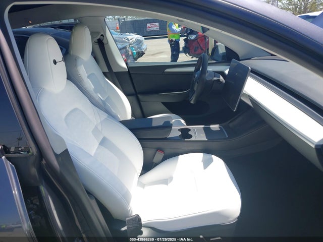 2023 TESLA MODEL Y 7SAYGDEE2PF902125 Photo 4