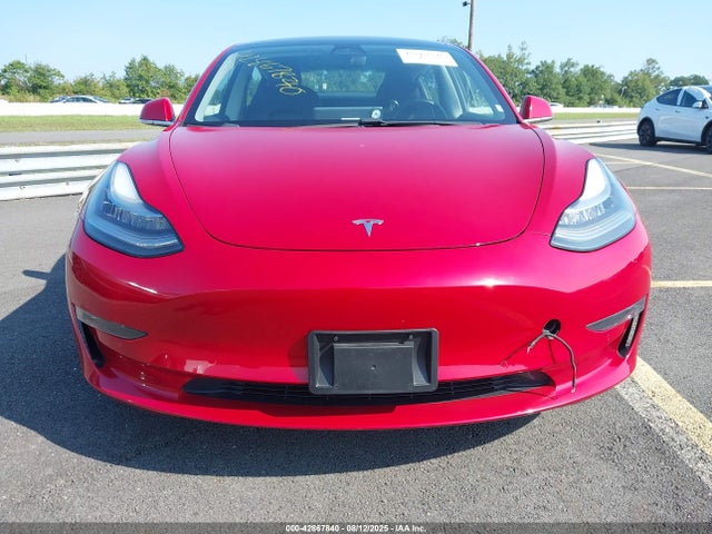 5YJ3E1EB7JF065574 Tesla 2018