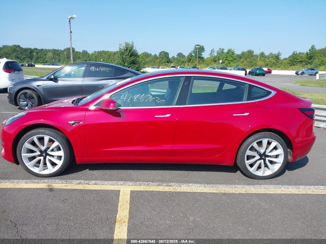 5YJ3E1EB7JF065574 Tesla 2018