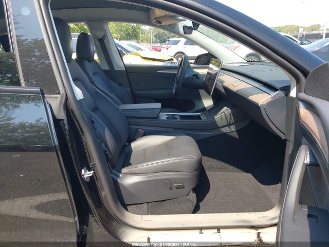 2023 TESLA MODEL Y 7SAYGDEE0PF856083 Photo 4