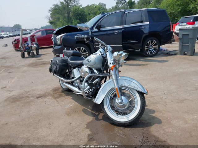 2011 HARLEY-DAVIDSON FLSTC 1HD1BW515BB033861