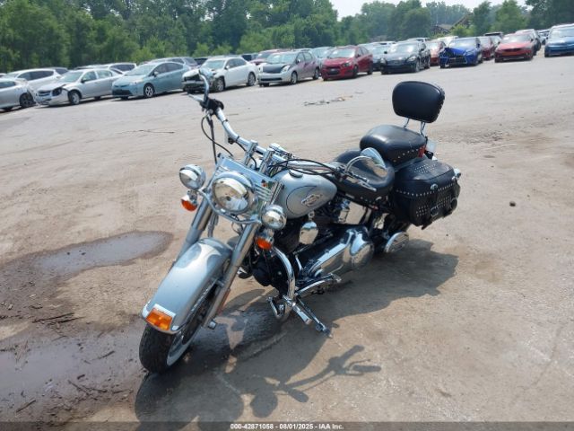 2011 HARLEY-DAVIDSON FLSTC 1HD1BW515BB033861 Photo 1