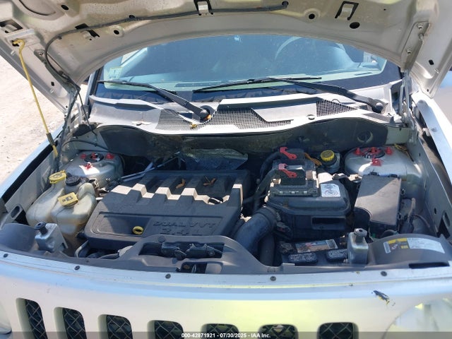 1C4NJRBB9ED560704 Jeep 2014