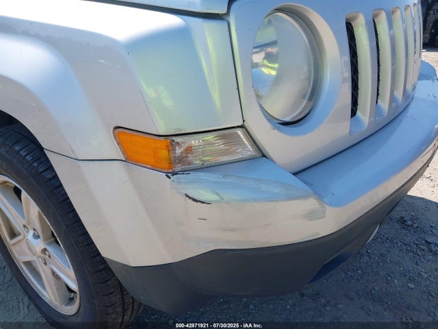 1C4NJRBB9ED560704 Jeep 2014